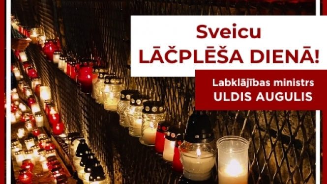 Lāčplēša dienas sveiciens no LM ministra. Sveces balti/sarkanās un apsveikums