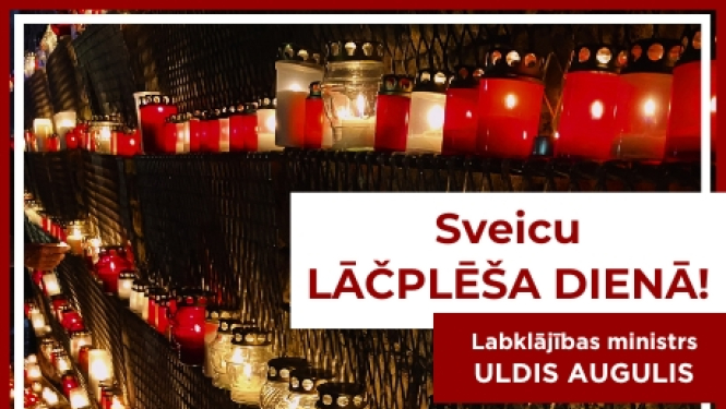 Lāčplēša dienas sveiciens no LM ministra. Sveces balti/sarkanās un apsveikums